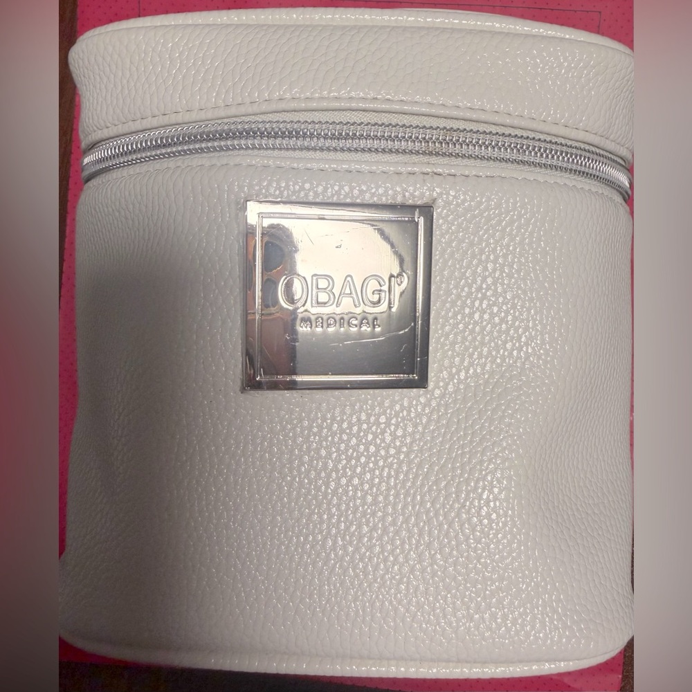 White with Tiffany Blue lined Obagi cosmetics vanity bag